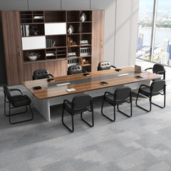 Black waiting room chairs in a large corporate office boardroom