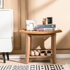 The shower bench with curved seat used as a shoe rack in a hallway