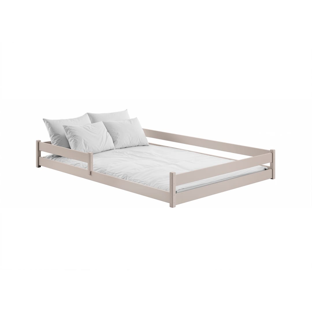 The soft beige wooden bed frame with white bedding and pillows