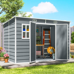 The grey garden shed with doors open, showing storage shelves and tools inside
