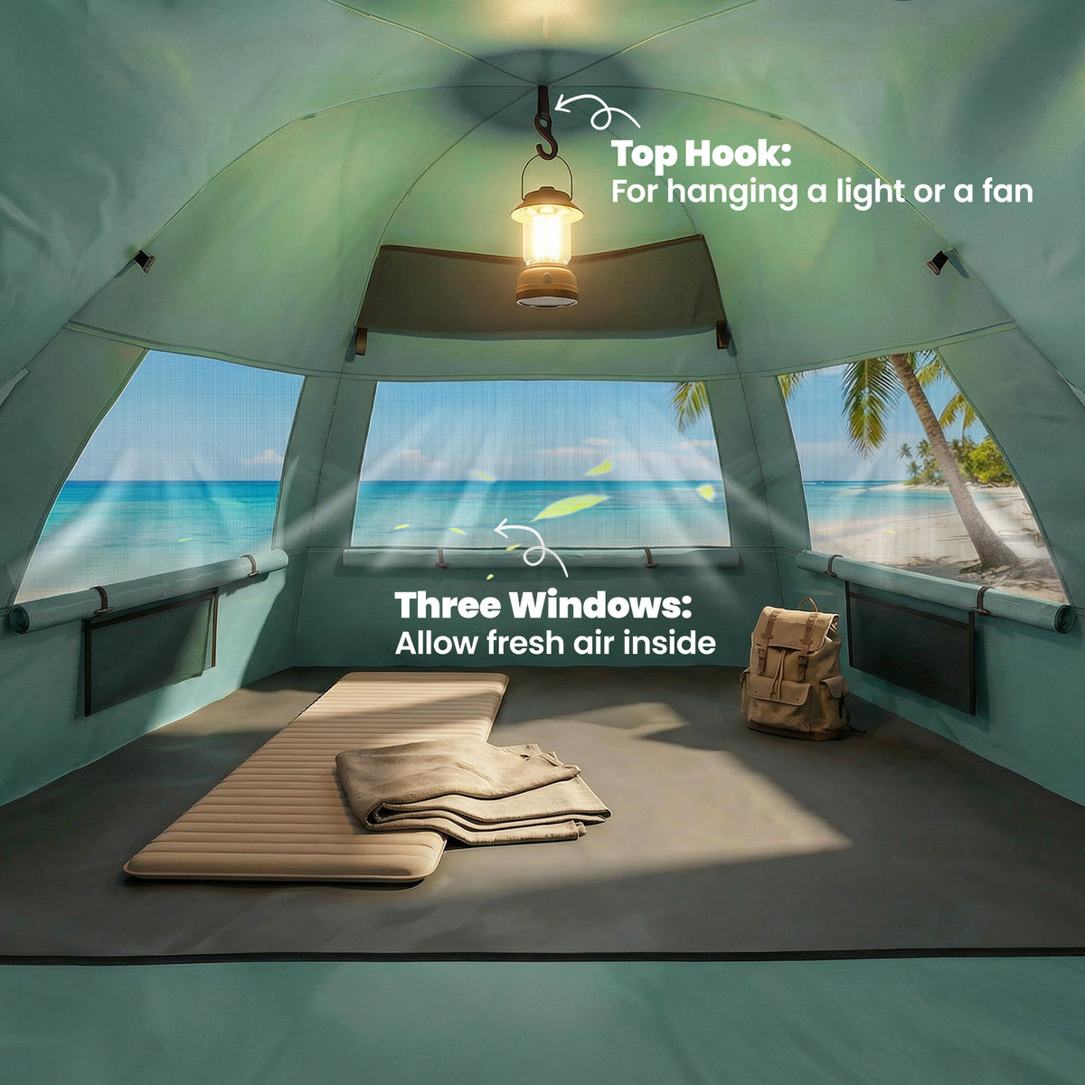 Inside the pop up beach tent showing a mattress, bag and hook for a light