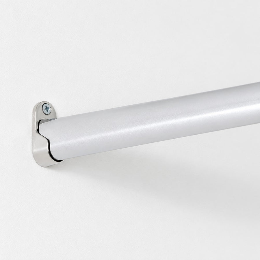 Metallic rod with bracket on a white background