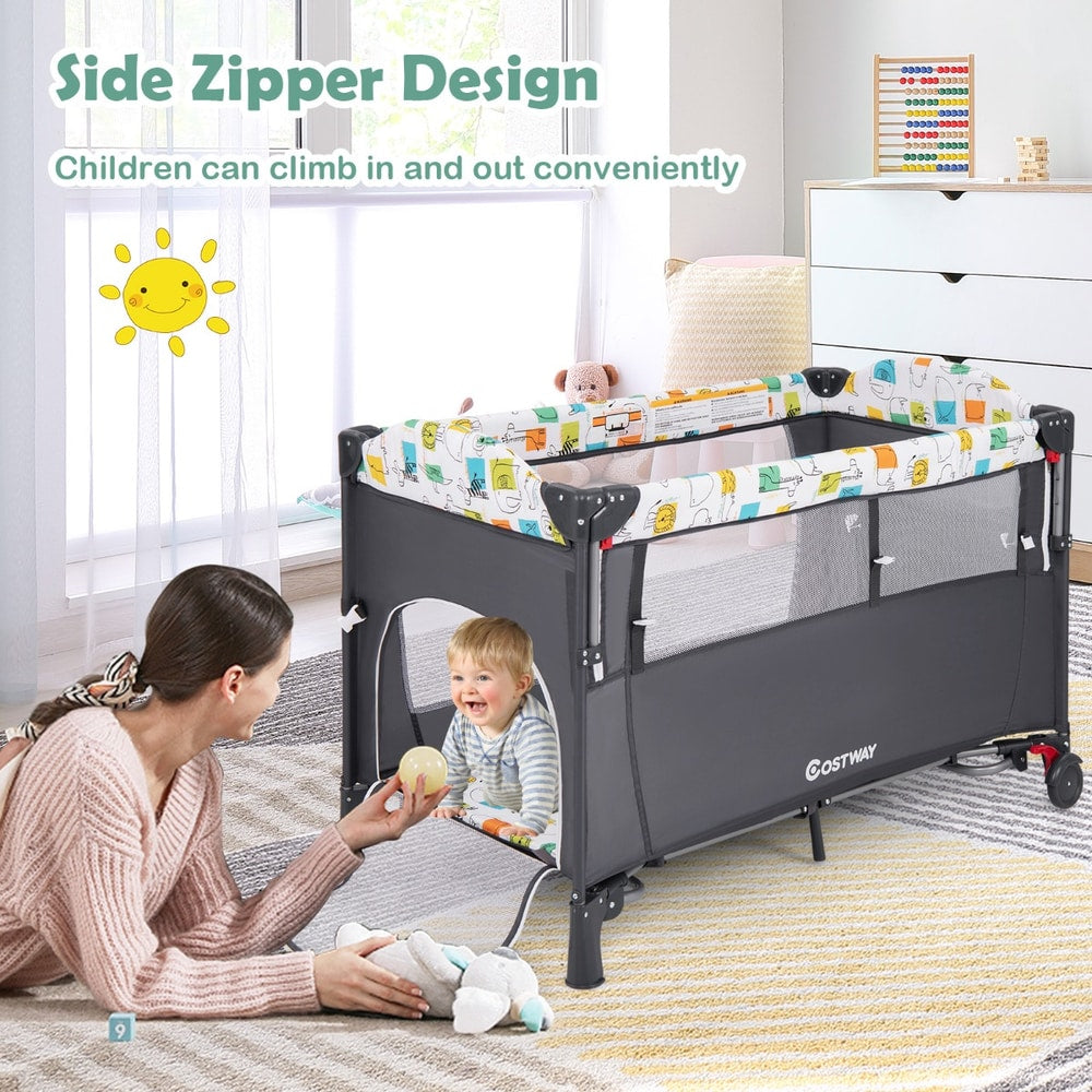 Grey baby bassinet with a side zipper opening and a child climbing out
