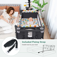 Grey bassinet bedside sleeper with fixing straps and instructions for bed attachment