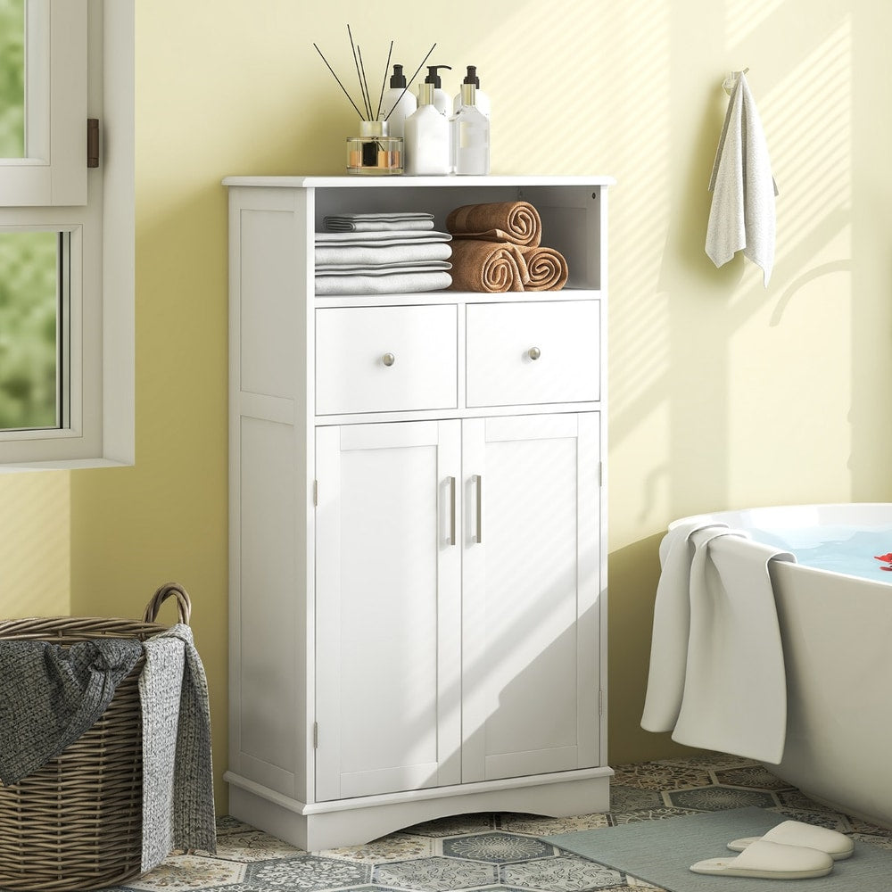 White floor cabinet for bathroom storage next to a bathtub