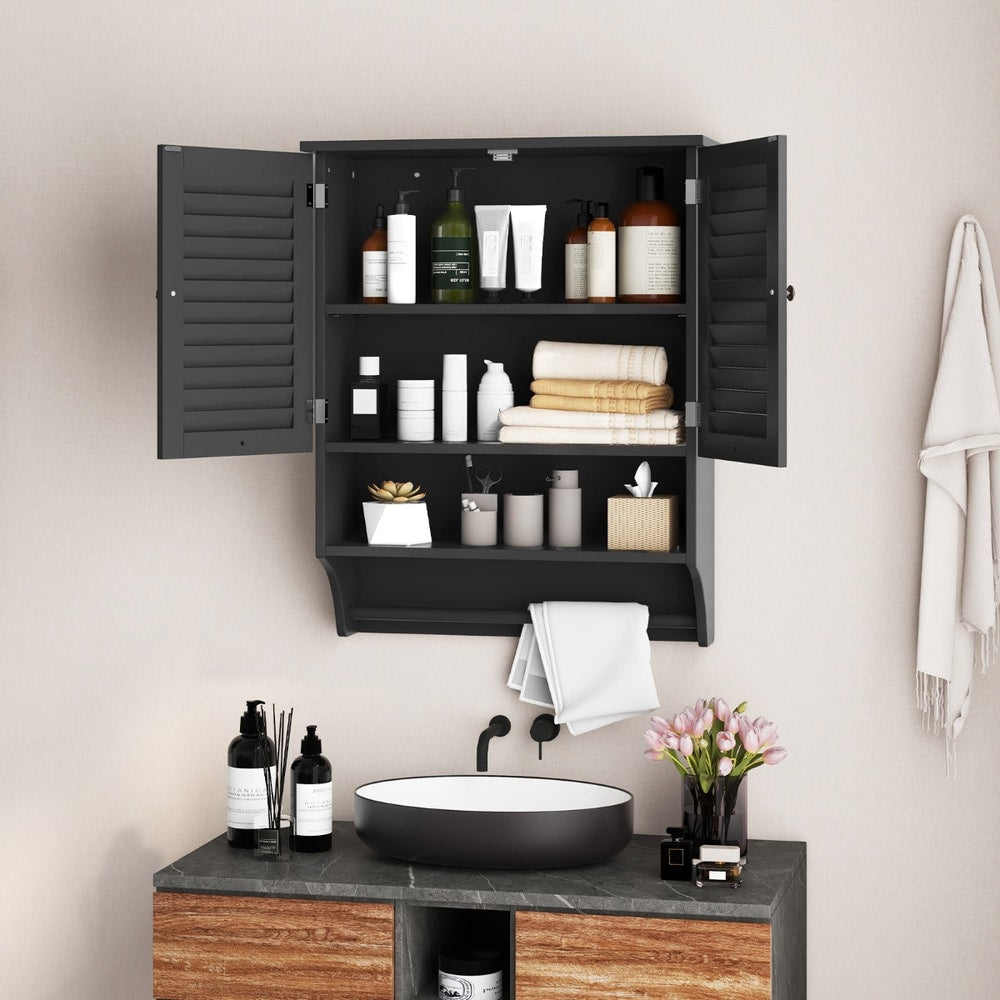 The wall cabinet mounted above a sink with doors open and filled with various toiletries