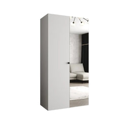 The hinged wardrobe in a clean white finish paired with a reflective mirror door