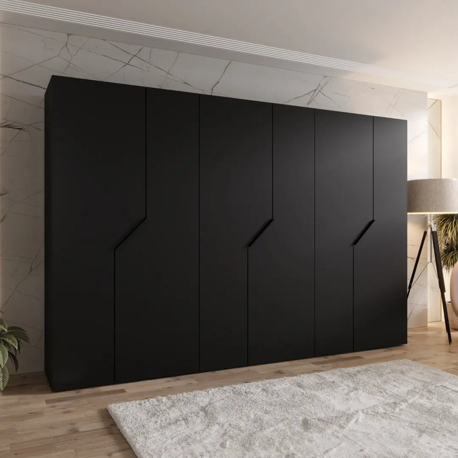Blomvik I Hinged Door Wardrobe 300cm in black finish standing in a modern bedroom with marble wall