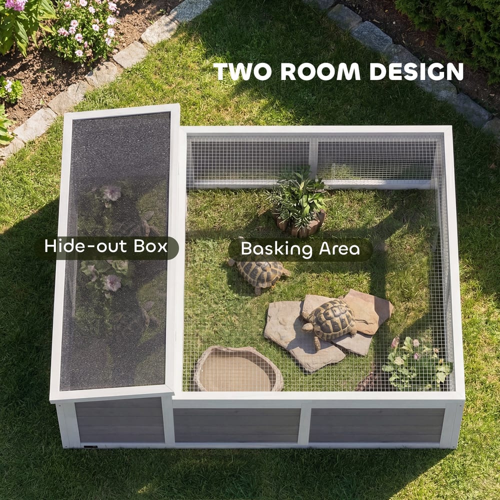 The two room tortoise enclosure with labels for hide-out box and basking area