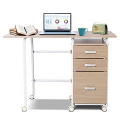 The computer desk is displayed with a laptop, books, a mug, and a vintage radio on top