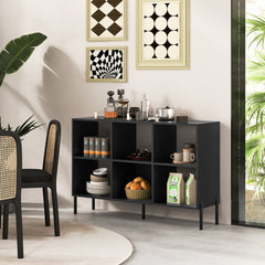 The black storage bookcase in a dining room with tableware and food items