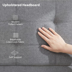Hand touching the grey tufted fabric of the upholstered headboard on the single ottoman bed