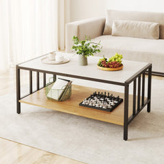 The coffee table is styled in a living room with a sofa and accessories