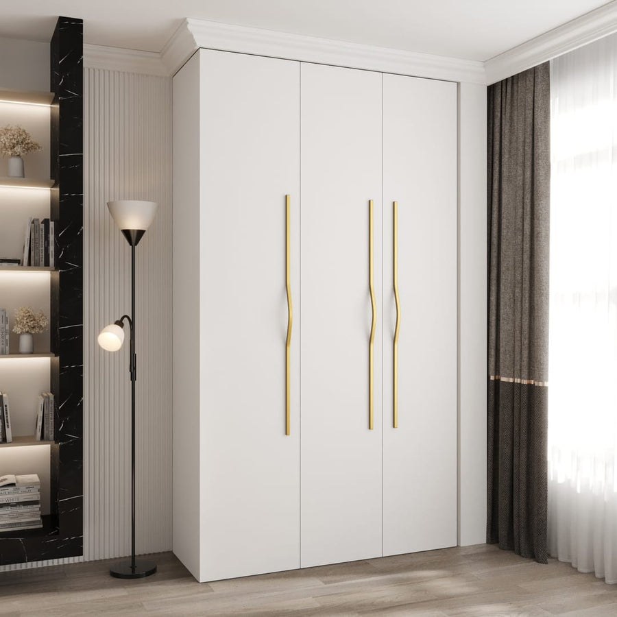 Como II Hinged Door Wardrobe 140cm in white standing in a modern bedroom with a floor lamp