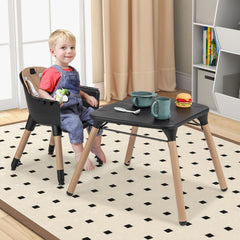 The toddler chair and small table set being used by a child in a playroom
