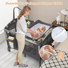 The changing table attached to the cot with a woman changing a baby and a close-up of the strap