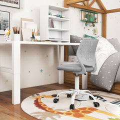 The grey ergonomic study chair in a bedroom setting on a colourful rug