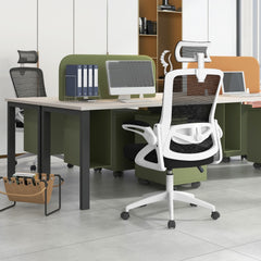 The office chair positioned at a desk in a bright modern workspace