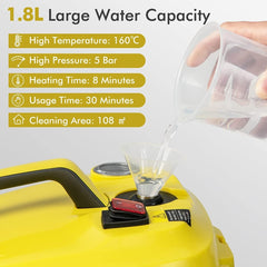 The steam cleaner being filled with water from a measuring jug into the top opening