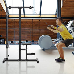 Man using the exercise pulley machine for a seated row exercise in a gym setting