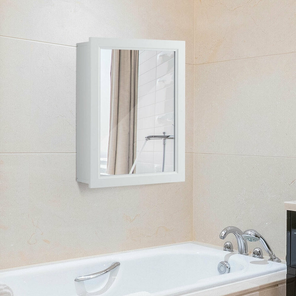 The wall cabinet mounted on a tiled bathroom wall above a white bathtub