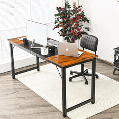 The large modern computer desk with a computer monitor, laptop and chair in a room