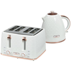 Cream honeycomb kettle and matching four-slice toaster with rose gold details on a wooden surface