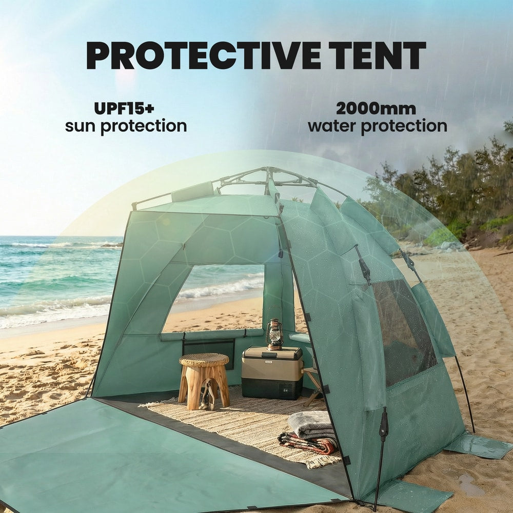 The pop up beach tent providing sun and water protection on the beach