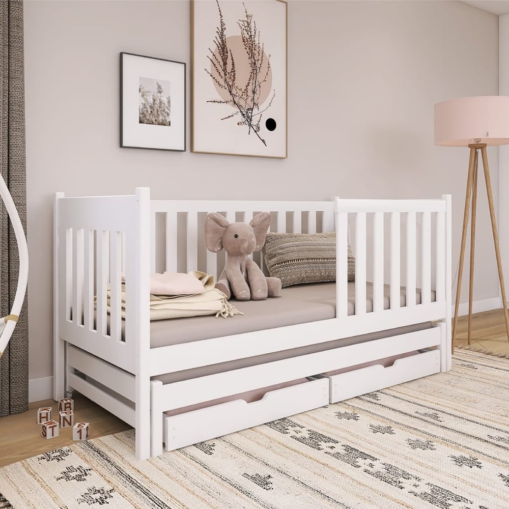 Kaja Single Bed with Trundle and Storage in a white finish with a plush elephant toy on the mattress