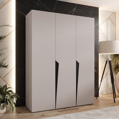 The hinged wardrobe in a light grey finish, presented in a stylish room setting with decorative wall panels