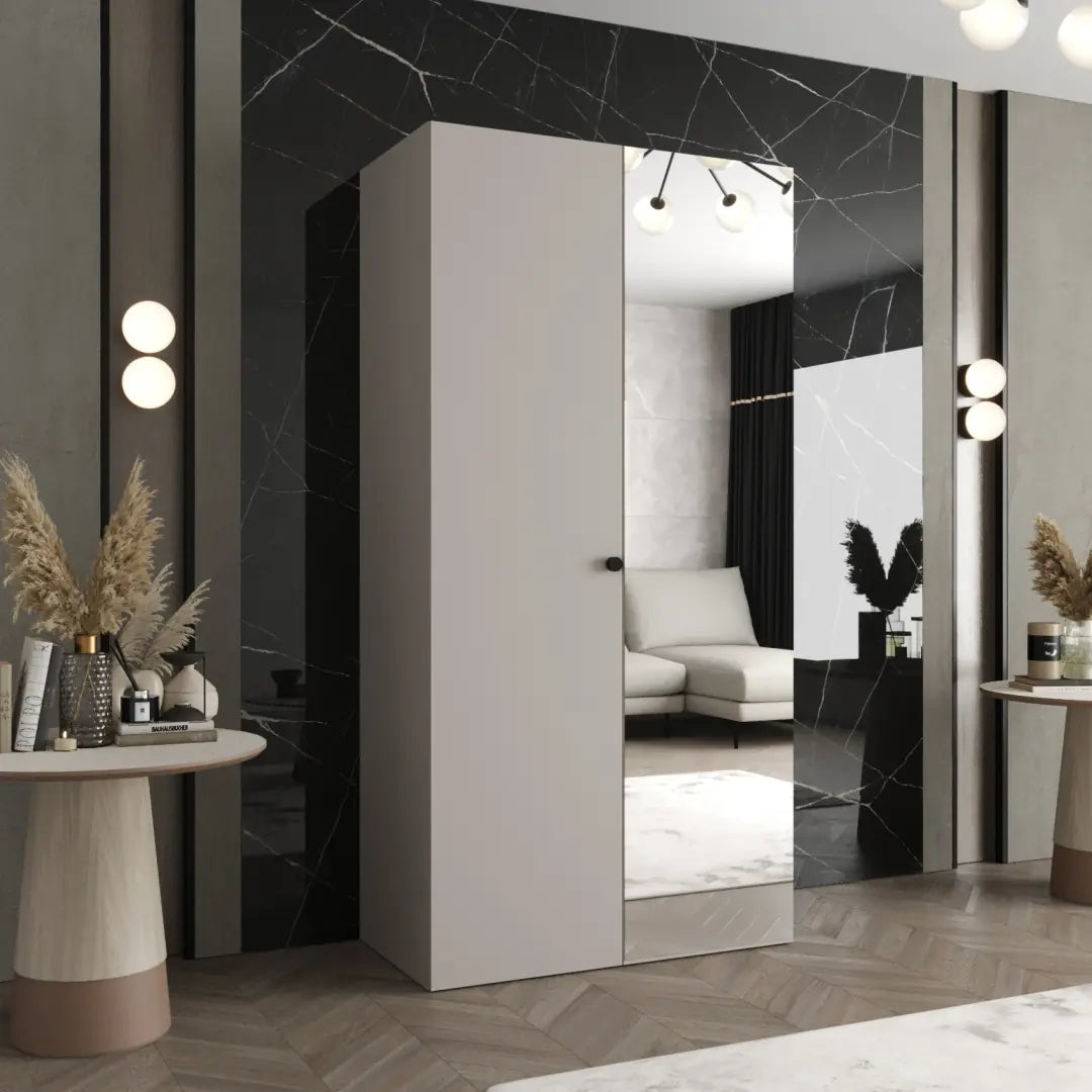 The hinged wardrobe in a light grey finish with a mirrored door