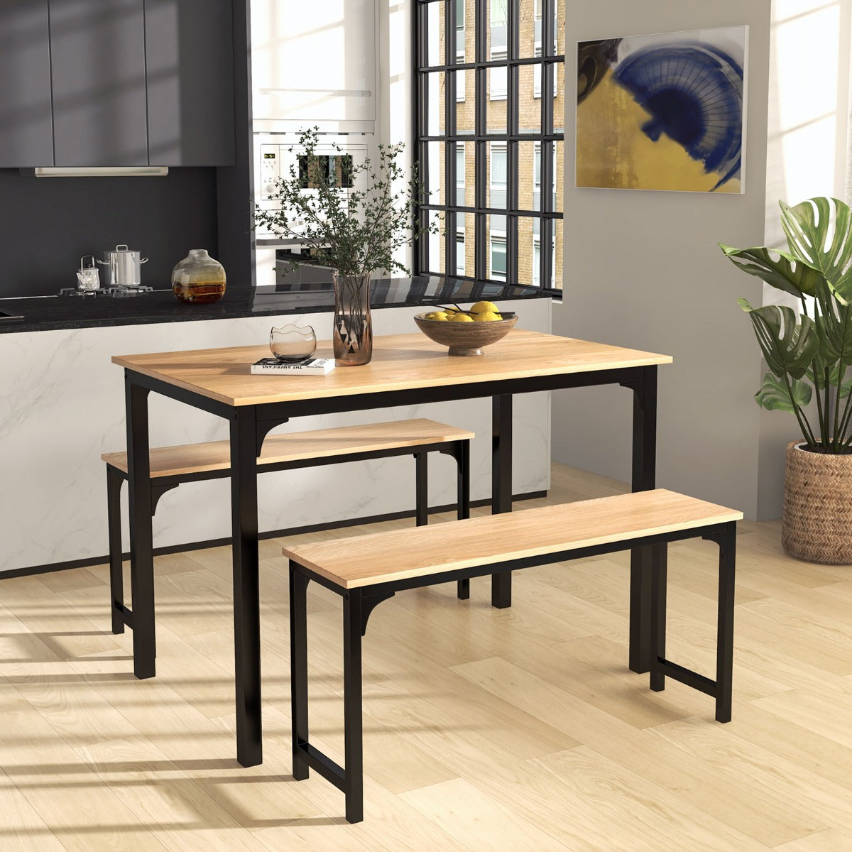 The dining room set placed in a modern kitchen area with wooden flooring and a large window