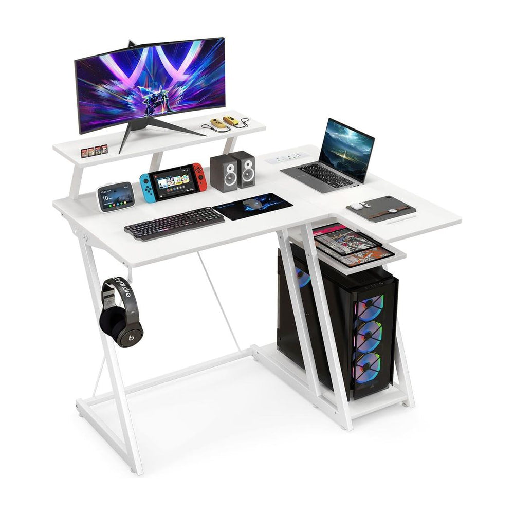 L-Shaped Gaming Desk with monitor shelf, keyboard, laptop and speakers on top