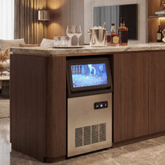 the ice maker machine producing ice in a modern home bar setting