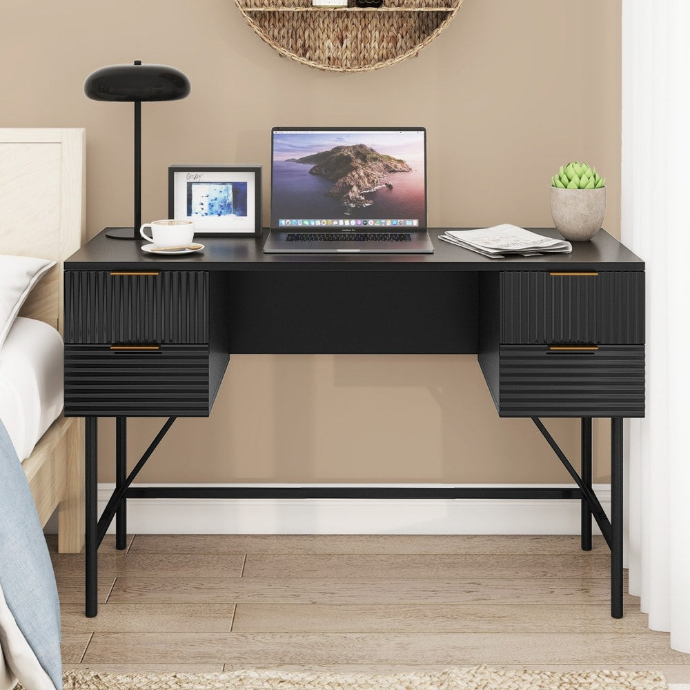 Office desk with drawers and storage, shown in a bedroom setting with a laptop and lamp