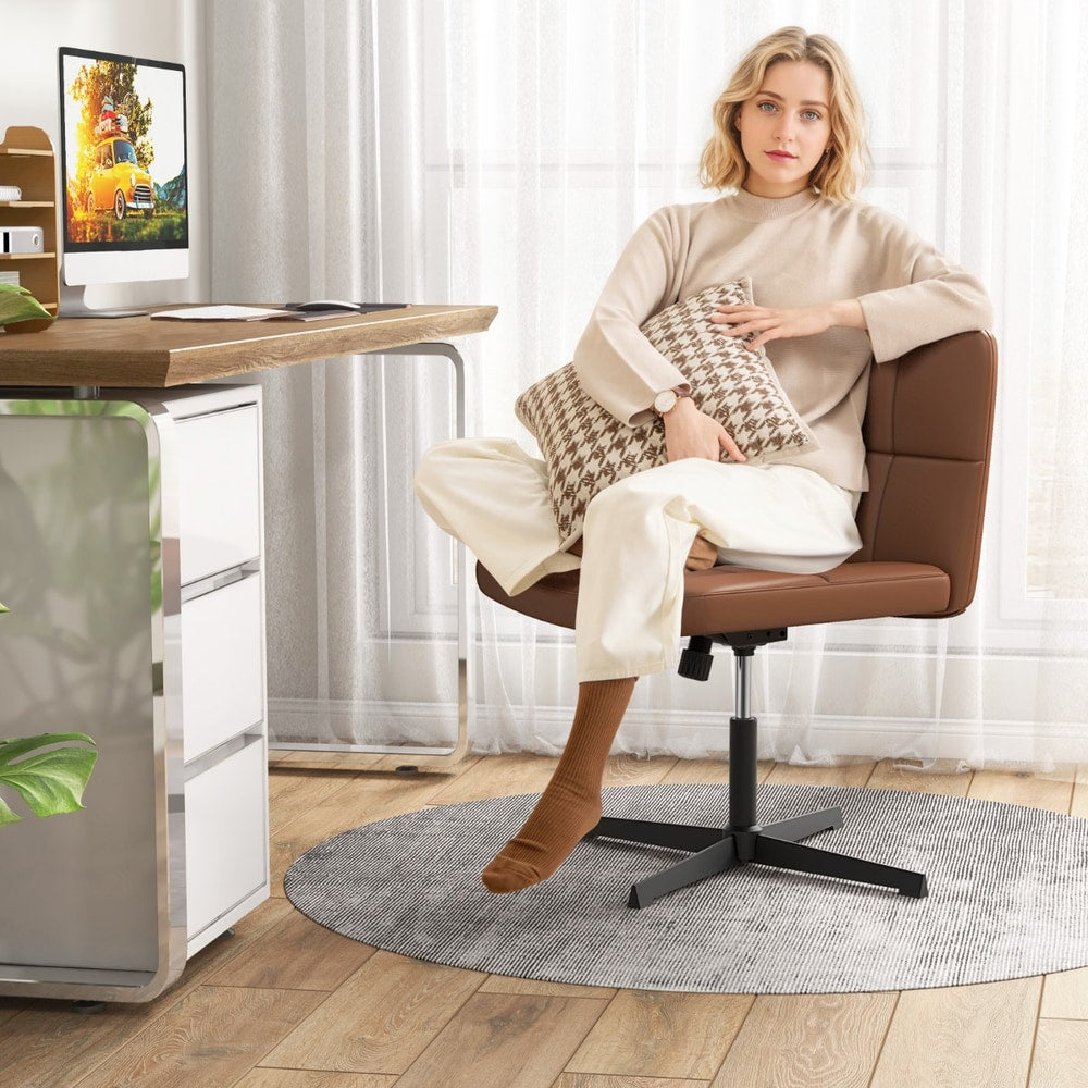Woman sitting on the brown PU leather upholstered armless office desk chair at a desk