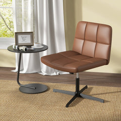 The brown PU leather upholstered armless office desk chair beside a small round table