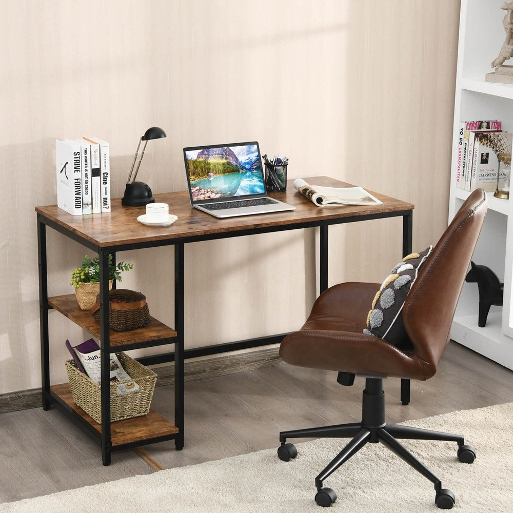 The office desk styled with a laptop and books next to a brown leather swivel chair