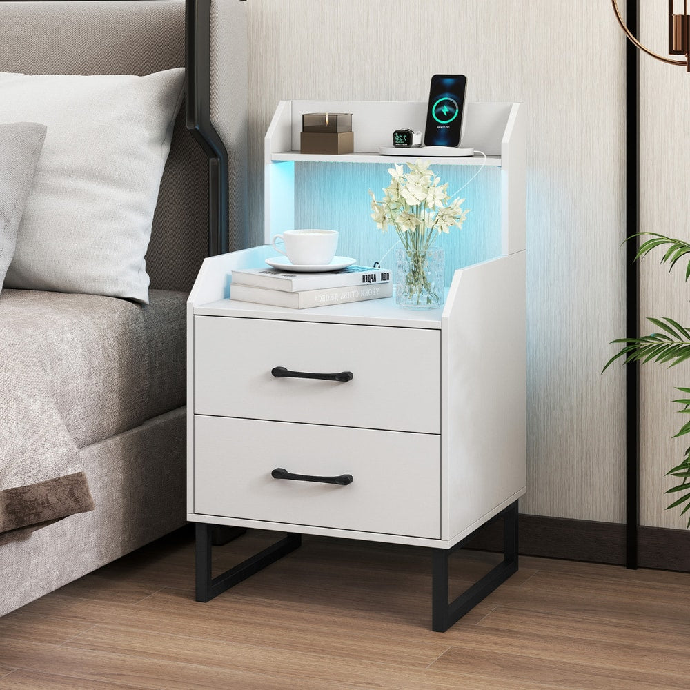 A single white bedside table with two drawers and a shelf with LED lighting