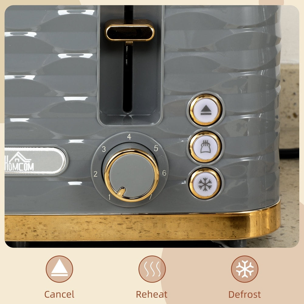 The four-slice toaster control panel showing the browning dial and cancel, reheat and defrost buttons
