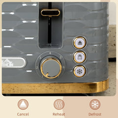 The four-slice toaster control panel showing the browning dial and cancel, reheat and defrost buttons