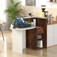 The office desk in a cafe setting with a plant, coffee machine and cups