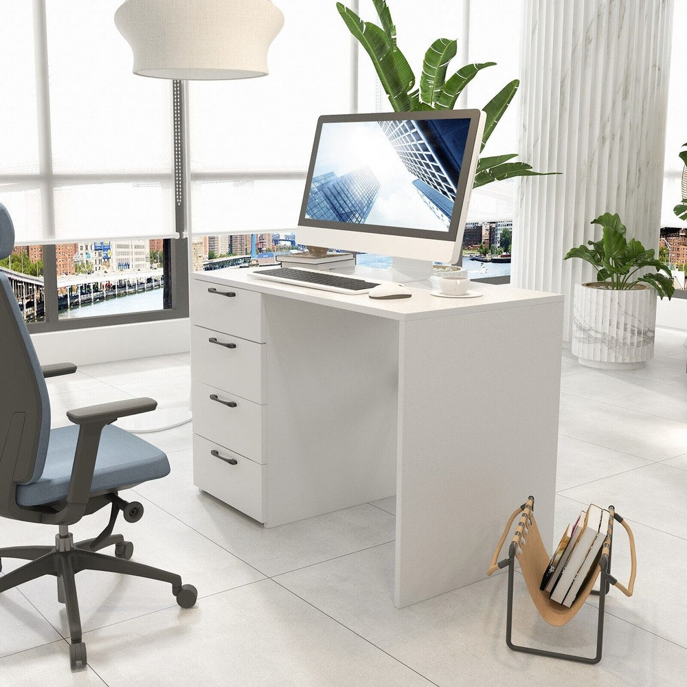 The white office desk is set up in a bright room with a computer and office chair