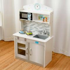 The play kitchen from a slightly different angle, showing the microwave, hob and sink details