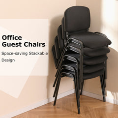The office chairs stacked vertically in a corner to demonstrate the space saving design