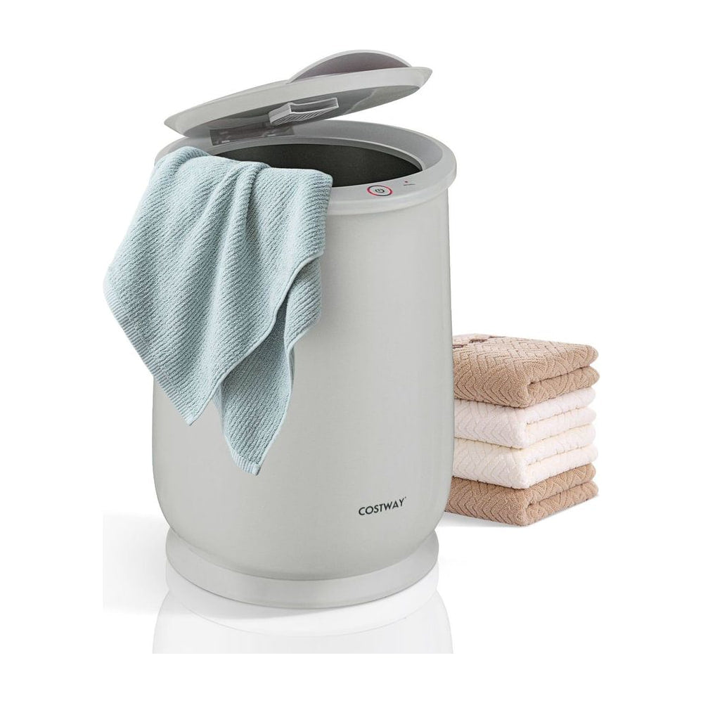 Towel Warmer Bucket Portable Spa Hot Towel Heater with a towel inside and folded towels beside it