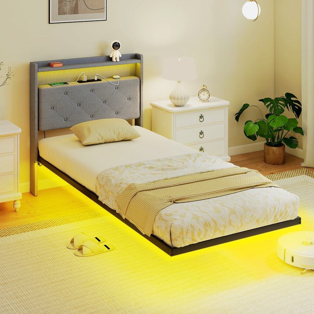 Upholstered single size bed with RGB LED lights illuminating the floor