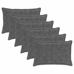 Six dark grey faux rabbit fur cushion covers arranged in a fan shape