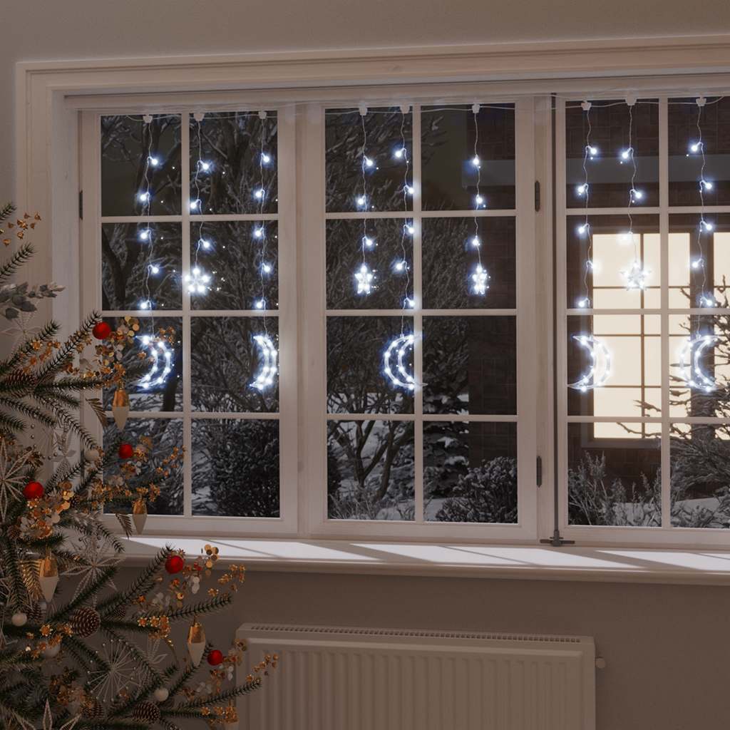 Star and Moon Fairy Lights Remote Control 345 LED Cold displayed hanging in a window at night