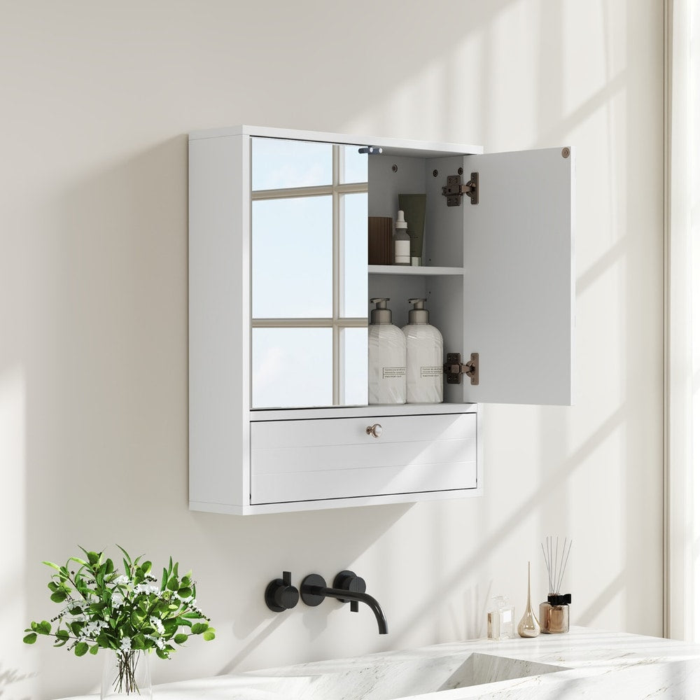 The wall cabinet mounted above a bathroom sink with the side door open